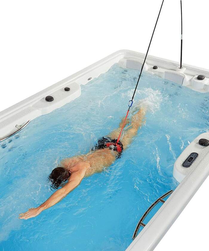 Astralpool Swimspa Creta with user swimming
