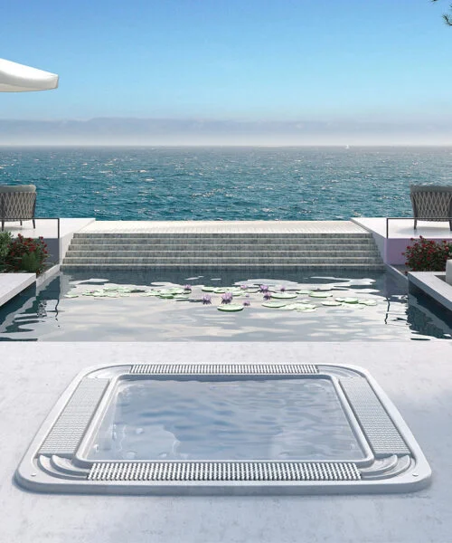 Astralpool Verona overflow spa with daytime hotel sea view