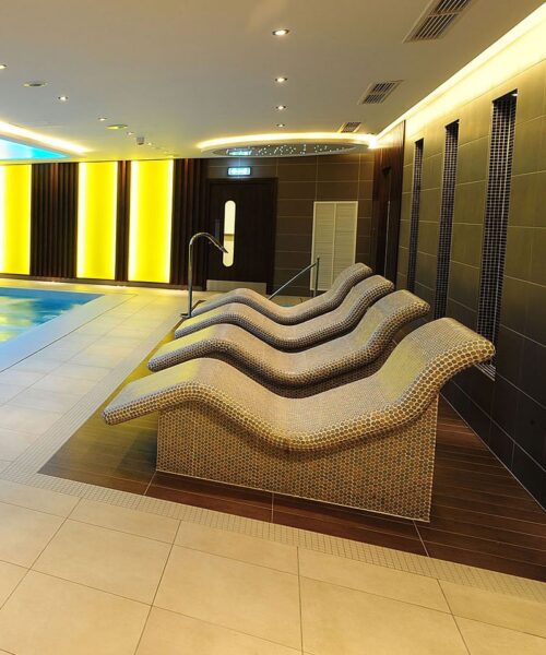 Heated tiled loungers in hotel spa