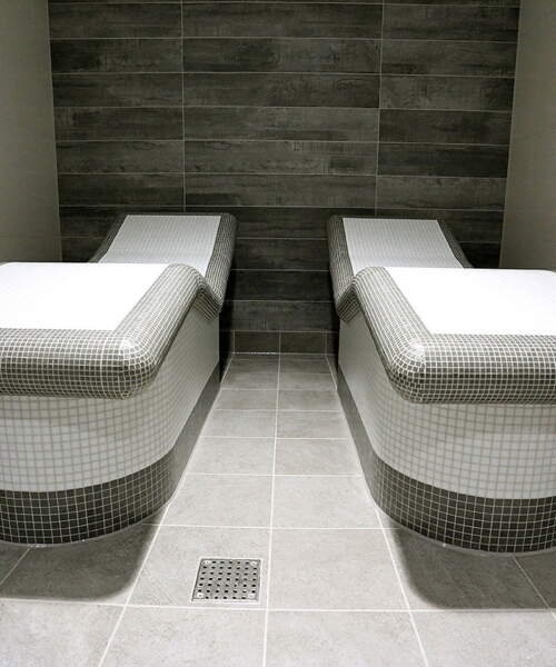 Tiled spa loungers white grey