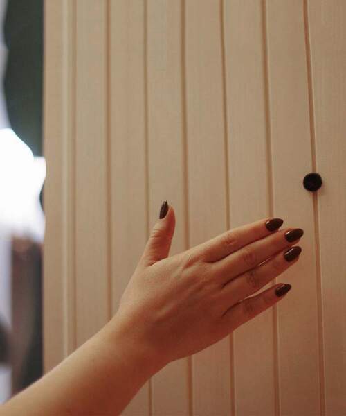 Hand motioning Tylo IR-Eye