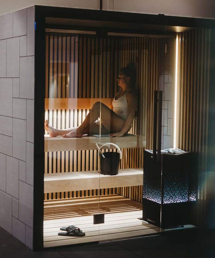 Woman enjoying session in Tylo Reflection RIB GF