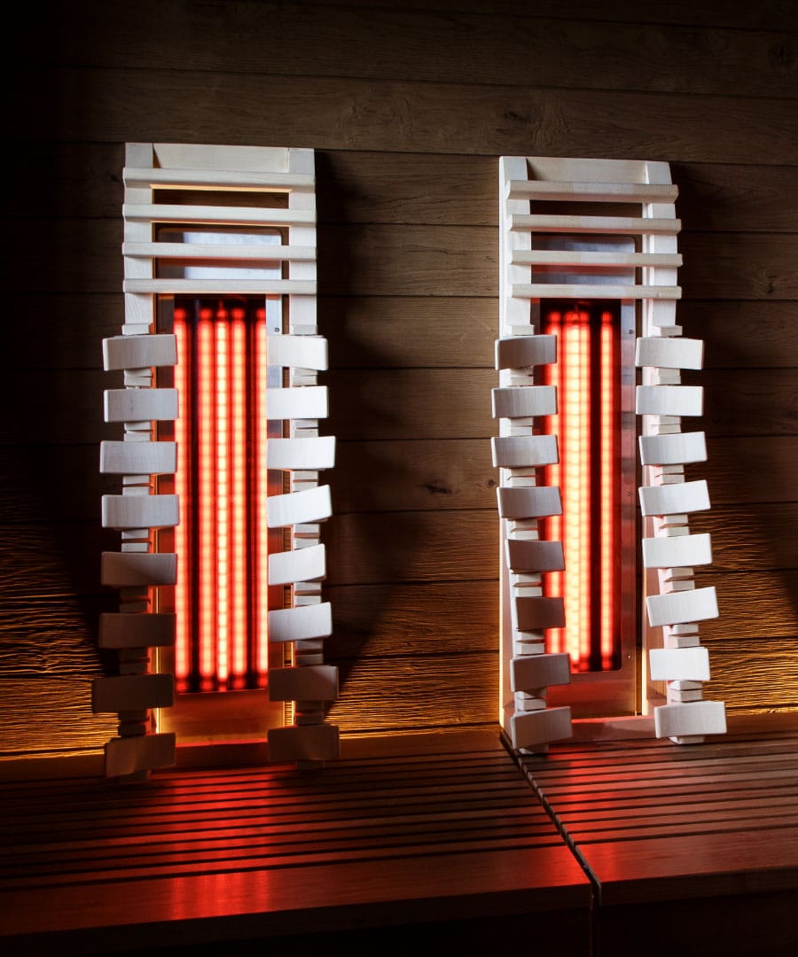 Harvia Vitae Infrared Radiator Installed in Sauna with Ergonomic Backrests