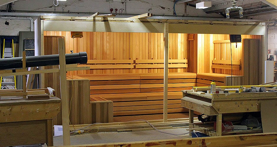 Bespoke sauna installation taking place on site.