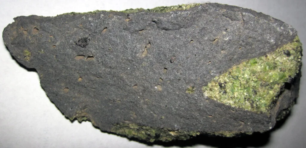 Composed largely of olivine and pyroxene, peridotite has sufficient properties for use as a sauna stone.